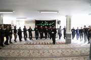 پرچم حرم مطهر امام حسین(ع) زینت‌بخش آیین عزاداری هشتم محرم در بنیاد شهید آذربایجان شرقی
